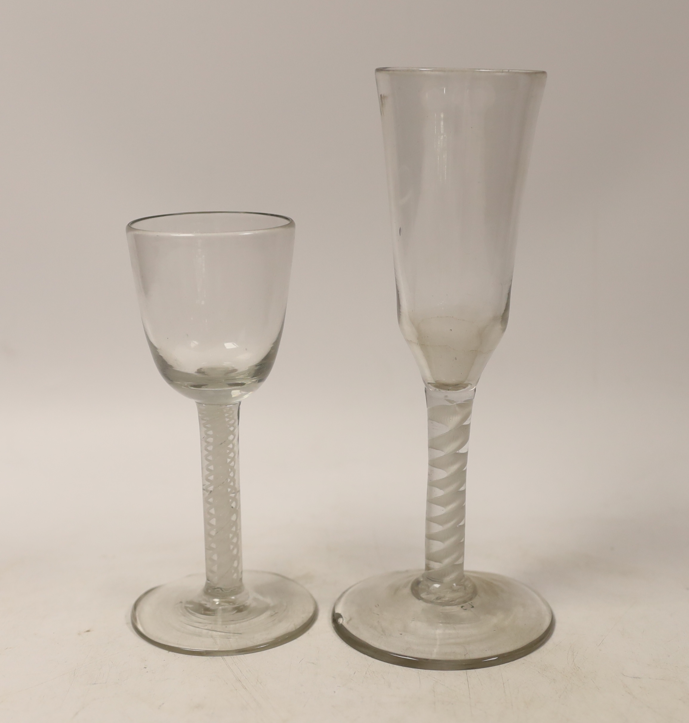 A George III DSOT stem wine glass, and single opaque twist stem ale glass, tallest 20cm